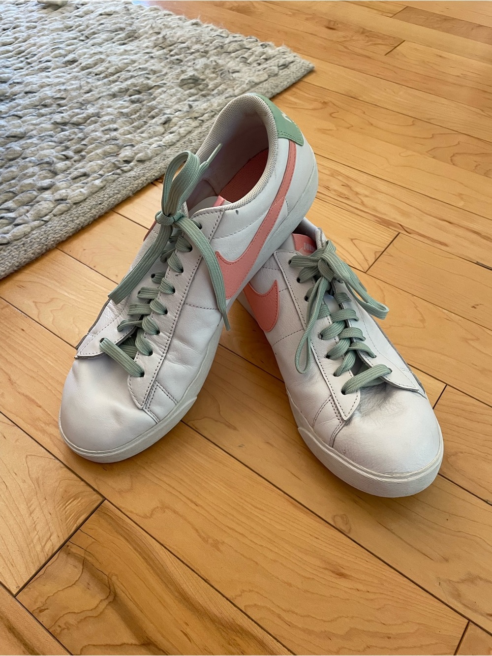 Nike Women’s White Sneakers with Pink Swoosh and Mint Laces